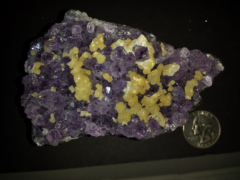 Calcite Crystals on Amethyst