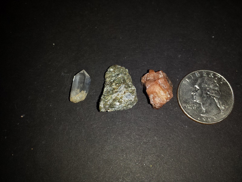 Three specimens. Quartz,Eastonite, and red Calcite