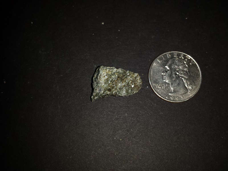 Three specimens. Quartz,Eastonite, and red Calcite