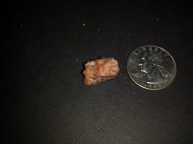 Three specimens. Quartz,Eastonite, and red Calcite