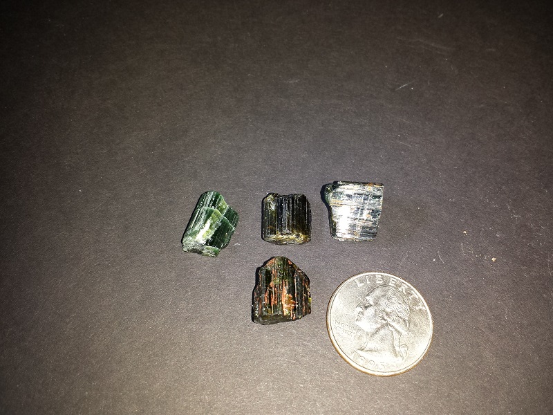 Four pieces of dark green Tourmaline