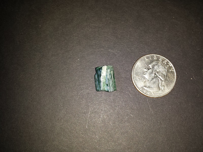 Four pieces of dark green Tourmaline