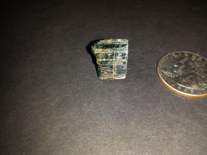 Four pieces of dark green Tourmaline